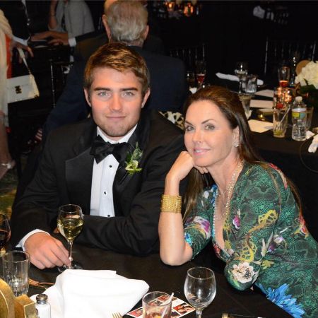 Liam Costner and his mother took a picture at an undisclosed event. 